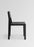 Vaarnii Maasto dining chair with a sleek wooden frame and upholstered seat, showcasing modern Scandinavian seating design.