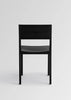 Vaarnii 016 Maasto dining chair with wooden frame and upholstered seat, modern seating design for dining rooms.