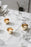 Skultuna Kin accessories displayed on a modern surface, showcasing sleek design and high-quality craftsmanship.