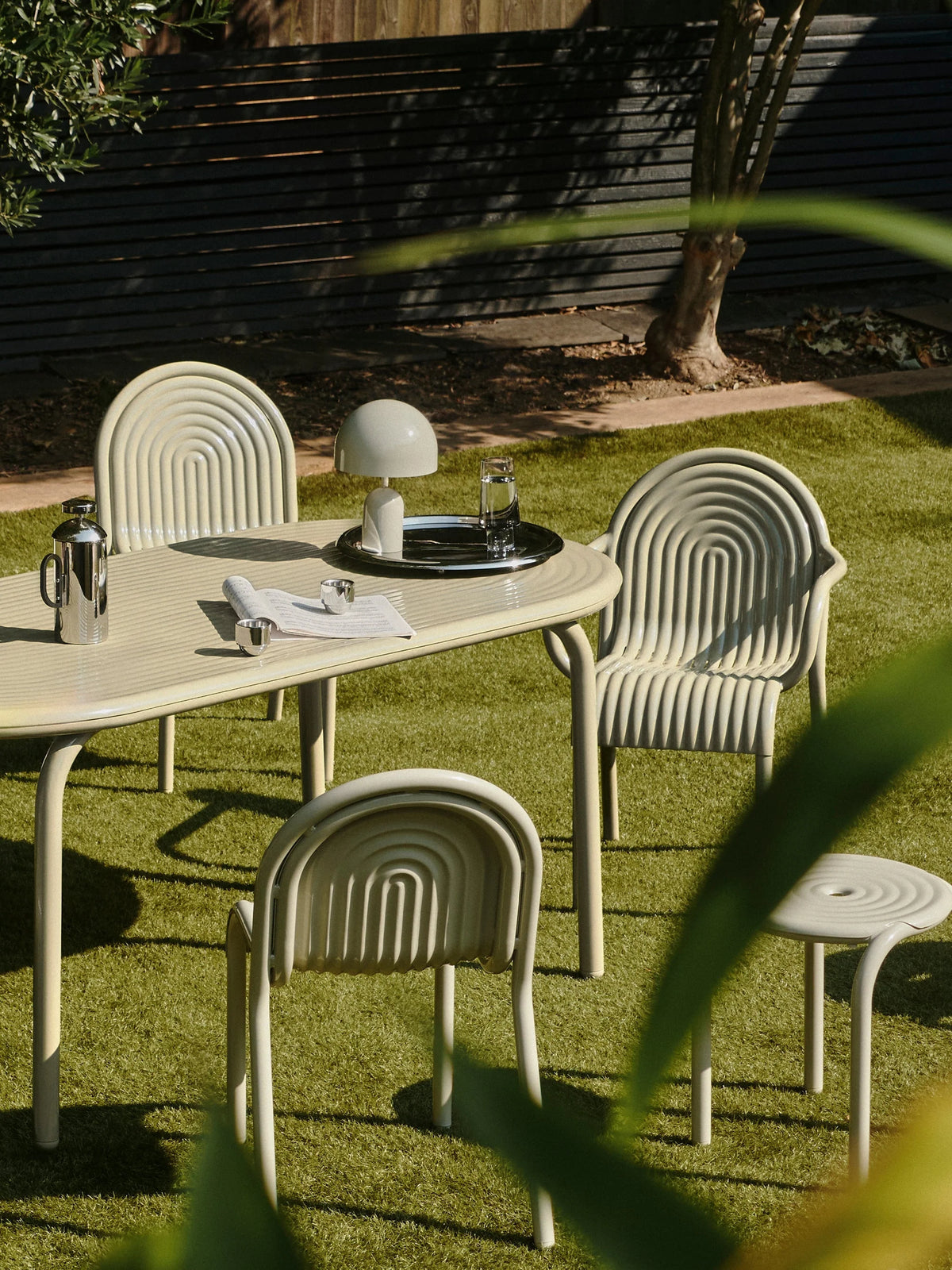 Groove Outdoor Arm Chair by Tom Dixon