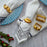 Brass Muse Napkin Rings by Jonathan Adler