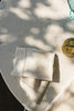 Set of four natural handloom napkins by Lorena Canals, showcasing woven fabric with traditional craftsmanship.