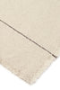 Set of four natural handloom napkins by Lorena Canals, soft fabric accessories with intricate woven patterns.
