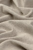 Handloom tablecloth by Lorena Canals in gray, showcasing intricate woven pattern and natural textile details.