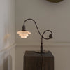 Modern Shop PH 1/1 piano table lamp with sleek design and adjustable arm, ideal for desk or bedside lighting.