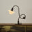 Modern shop PH 1/1 piano table lamp with sleek design and adjustable arm, ideal for desk or bedside lighting.