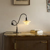 Modern Shop PH 1/1 piano table lamp with a sleek design and adjustable arm, perfect for reading or accent lighting.