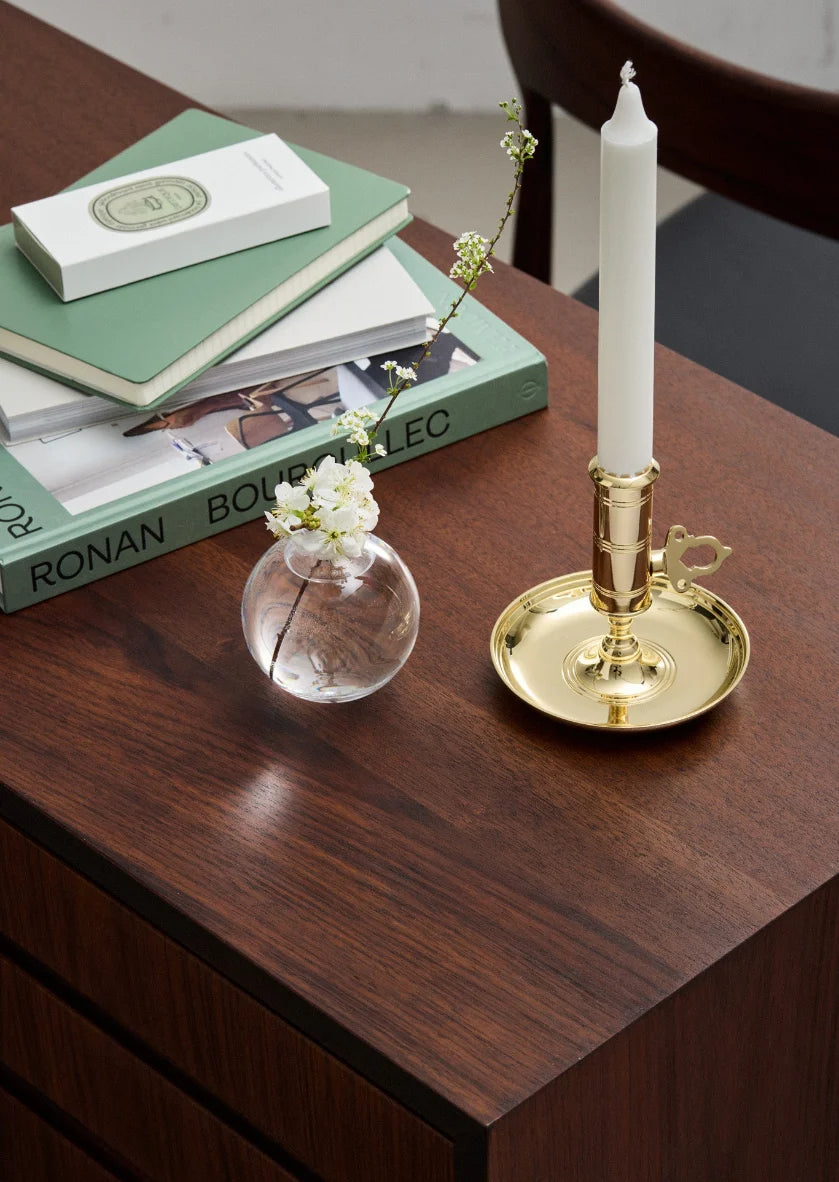 Elegant Skultuna office candle holder with a sleek metal design, perfect for desk or office decor accessories.