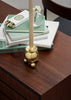 Elegant Skultuna ball candlestick accessory with a polished metallic finish, designed to hold a candle securely.