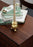 Elegant Skultuna ball candlestick accessory with a polished metallic finish, designed to hold a candle securely.