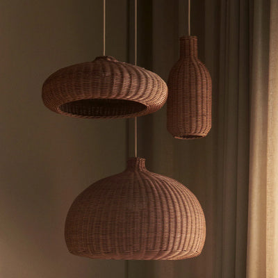 Ferm Living braided lampshade hanging from ceiling light fixture, woven design, neutral tones, stylish modern lighting accessory.