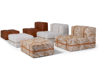 Moooi Haybale Lounge Chair with matching footstool in neutral fabric, showcasing a modern, sculptural seating design.