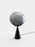Tom Dixon Melt Fat Cone black table light with polished nickel finish, showcasing modern lighting design with a sleek, sculptural shape.