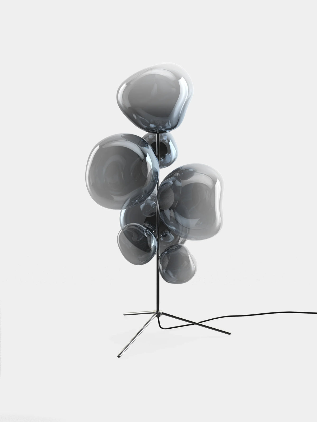 Polished nickel Melt Floor Chandelier by Tom Dixon featuring a sculptural, modern lighting fixture with glossy finish and geometric design.
