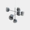 Large Melt chandelier by Tom Dixon, polished nickel finish with sculptural, modern lighting design and polycarbonate accents.