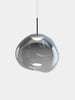 Polished nickel Melt Medium Pendant light by Tom Dixon, featuring a smooth, sculptural design with a glossy finish and polycarbonate material.