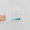 Gradient Newton's Cradle by Block Design