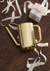 Skultuna Nurture Watering Can, stylish accessories for gardening, with a sleek design and metal finish.