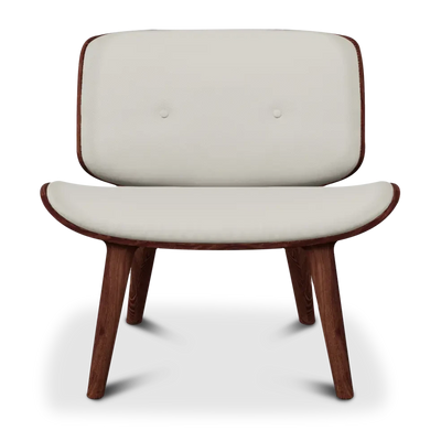 Cream and cinnamon Nut Lounge Chair by Moooi, modern seating with plush cushions and stylish design, shown from a side angle.