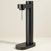 Stelton Brus Carbonator accessory in black metallic finish, designed for carbonating beverages with sleek modern style.