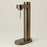 Bronze metallic Brus Carbonator accessory by Stelton, featuring sleek, modern design with textured metallic finish.