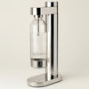 Stelton Brus Carbonator accessory in sleek steel finish, designed for carbonation and beverage preparation.