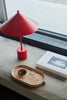 Kasa Table Lamp in cherry red by OYOY, featuring a rounded shade and compact base