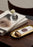 Elegant Skultuna oval tray made of metal, with a smooth polished surface, ideal for serving or decorative use.