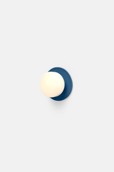 Rich Brilliant Willing Pastille 1 Disc custom color lighting fixture with a sleek, round design, showcasing vibrant color options.