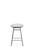 Low black wire bar stool from Pastoe's KM06 Bar Stool Low collection, showcasing a sleek seating design with a modern frame.