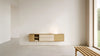 Natural oak landscape wall cabinet by Pastoe with multiple storage compartments, mounted on a wall in a modern interior.