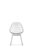 SM05 Wire Dining Chair by Pastoe featuring a sleek chrome frame and wire seat design, perfect for modern dining spaces.