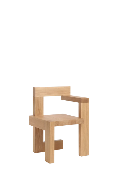 Pastoe Stelman chair with an armrest on the right, showcasing a sleek wooden design and modern seating style.