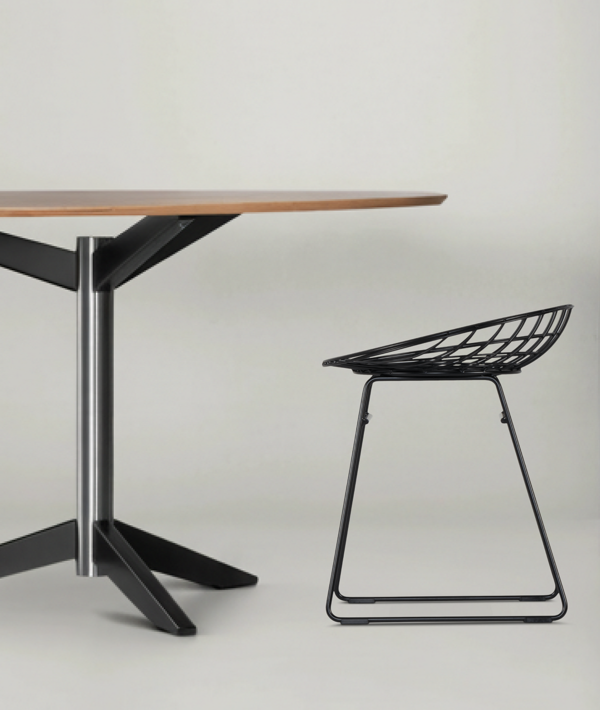 Wire stool by Pastoe featuring a sleek, minimalist design with a metal wire frame and a wooden seat for modern seating.