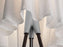 Elegant Rosy Angelis lighting fixture by Flos, showcasing its soft pink shade and sleek modern design.