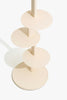 Creamy white Plates shelving unit by Established and Sons featuring raw-edged storage plates on a white background.