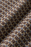 Checker placemat by Lorena Canals in a coffee-colored checkered pattern