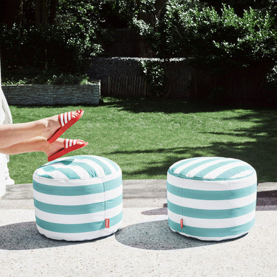Fatboy Point Olefin Ottoman and footrest in azur blue, versatile indoor and outdoor seating with modern design.