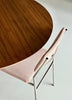 Black TE06 dining table by Pastoe with sleek RVS metal legs, showcasing a modern design and smooth surface.