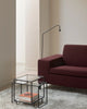 Close-up of the Tangled Side Table by Pastoe showing intricate woven design and natural wood finish.