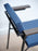 Close-up of the Pastoe SE69 dining chair showing its sleek wooden frame and upholstered seat for comfortable seating.