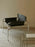 Black leather SZ14 armchair by Pastoe, stylish seating with a modern design and sleek appearance.