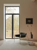 Black SZ14 armchair by Pastoe, modern seating with sleek design and comfortable cushioning, shown from a front view.