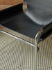 Black SZ14 armchair by Pastoe, stylish seating with modern design and comfortable upholstery, close-up detail view.