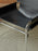 Black SZ14 armchair by Pastoe, stylish seating with modern design and comfortable upholstery, close-up detail view.