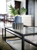 Black Tangled Coffee Table by Pastoe featuring a unique woven design and sleek modern style.