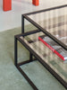 Black Tangled Coffee Table by Pastoe featuring a unique twisted design, made of sleek, modern tables for contemporary living spaces.