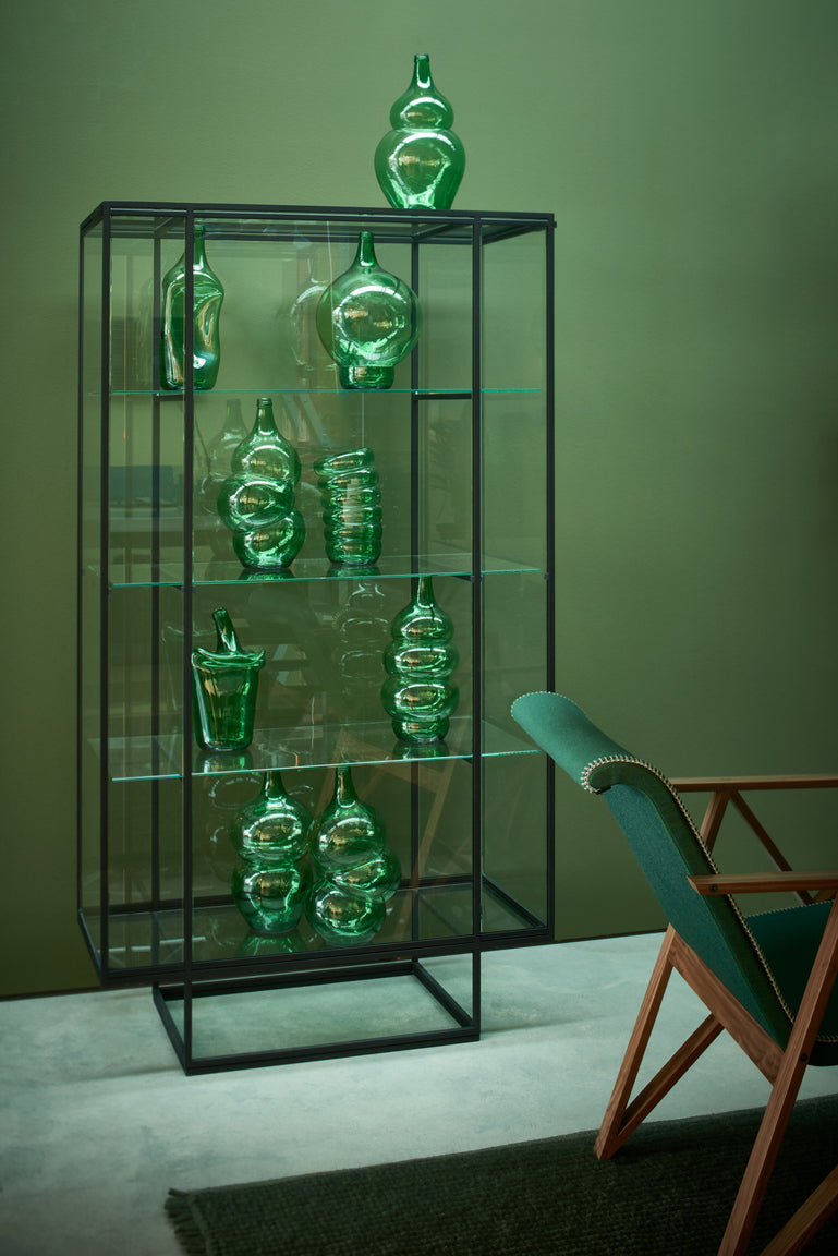 Pastoe Tangled Showcase storage cabinet with intertwined wooden shelves and doors, showcasing modern, minimalist design.