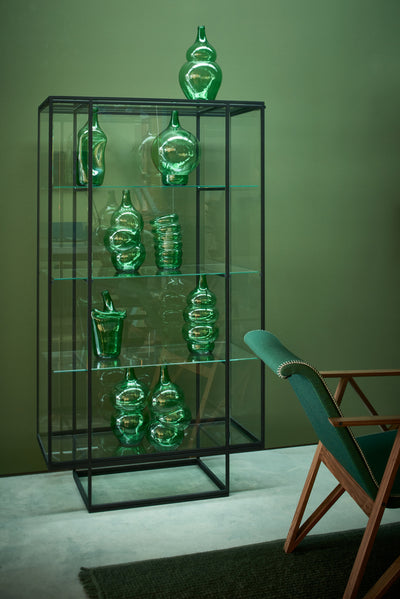 Pastoe Tangled Showcase storage cabinet with intertwined wooden shelves and doors, showcasing modern, minimalist design.