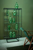 Pastoe Tangled Showcase storage cabinet with intertwined wooden shelves and doors, showcasing modern, minimalist design.